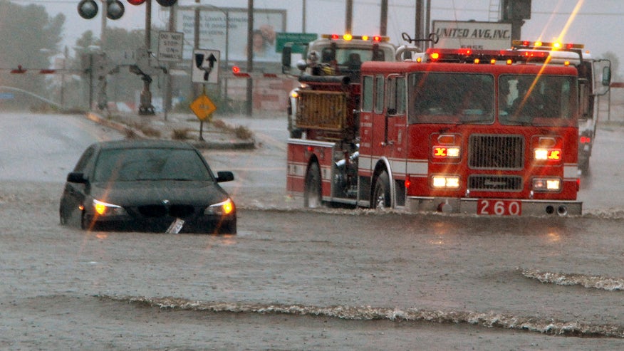 SoCal Weather car and fire truck flooded street